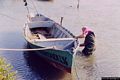 Is Benas: barca di pescatori nello stagno di Is Benas Is Benas: barca di pescatori nello stagno di Is Benas