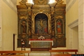 Sinnai-chiesa parrocchiale di Santa Barbara Vergine e Martire: il fastoso altare collocato nella Cappella del Santo Cristo