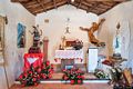 Talana-Festa di Sant&rsquo;Efisio: interno della chiesa con il simulacro del Santo
