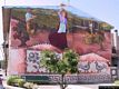 Tinnura-Un murale sulle case del paese