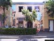 Tinnura-Un murale sulle case del paese