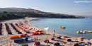 Trinità d’Agultu e Vignola: isola Rossa: spiagghja longa di Isola Rossa ossia la spiaggia lunga dell’Isola Rossa chiamata anche spiaggia di Rinaggiu