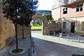 Ulassai: in piazza Umberto il passaggio sotto l’arco che conduce in piazza Barigadu