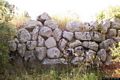 Uras-resti del nuraghe complesso Sa Domu Beccia: mura del nuraghe Uras-resti del nuraghe complesso Sa Domu Beccia: mura del nuraghe