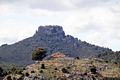 Urzulei: veduta del nuraghe Perdeballa con sullo sfondo il monte Novo San Giovanni