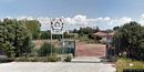 Ussana-Il cancello del parco dove si trova il ristorante Pizzeria su Maritzosu