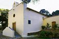 Villacidro: chiesa di Nostra Signora dei Carmelo: veduta da destra con la poesia di Gavino leo
