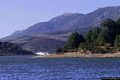 Villagrande Strisaili-Il Lago Alto del Flumendosa: un canadair fa rifornimento di acqua nel lago per andare a spegnere un incendi