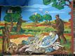 Villamar-Murales sulle case del paese: scena di caccia